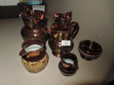 A selection of lustre ware jugs and similar