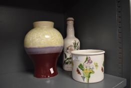 A selection of Portmeirion including dish, corked bottle and baluster vase with plum and lustre/
