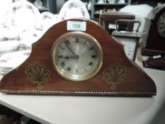 A mantle clock having transfer design and serpentine design