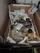A box of varied door knobs including glass and some boxes of screws.