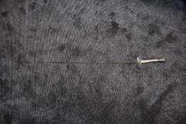 A vintage fencing foil.