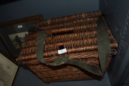 A large vintage fishing basket.
