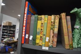 A selection of vintage Enid Blyton books and a copy of the Beano book.
