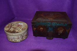 Two collectable biscuit tins, one being Huntley and Palmer having christmas scene, the other Co-