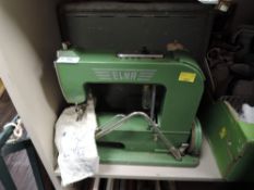 A vintage Swiss manufactured Elna 1(1940-52) sewing machine and case.