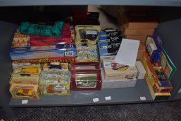 A shelf of modern diecasts including Lledo Days Gone, Corgi Classics, Matchbox Christmas