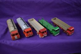 Nine Dinky diecast flat beds and tankers, a Dinky diecast Car Transporter with Ramp and a Dinky
