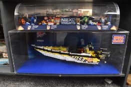 A Mega Bloks shop display, Wave Racer, Pro Builder Series, 570 pieces along with a Lego Nexo Knights