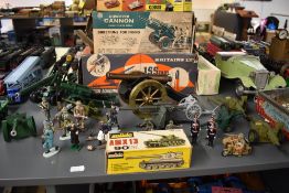 A collection of Military diecast and lead Tanks, Field Guns, figures and Motobike with Sidecar