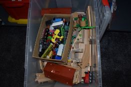 A box of Brio wooden trains, track and accessories