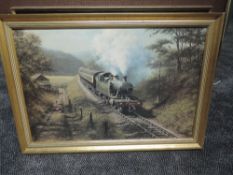 A framed print after Don Bracken, Racing The Train