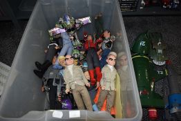 A box of modern Thunderbird and Buzz Lightyear dolls and diecast vehicles