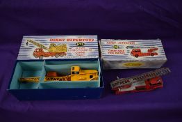 Five Dinky Supertoys diecasts, Fire Engine x2 955, Turntable Fire Escape 956, Euclid Rear Dump Truck