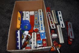 A box of playworn diecasts including Corgi Chitty Chitty Bang Bang Cars, Corgi Car Transporters etc