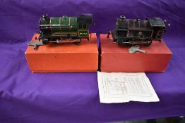 Two Hornby 0 gauge clockwork 0-4-0 Locomotives numbered 82011 and 50153, both boxed No 40 & No51