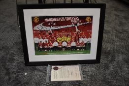 A framed print, Manchester United 2006/07 Squad, bearing several signatures with certificate of
