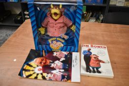 A David Halsall Limited Bendy Bully with sound in original box, a volume Jim Bowen Right Place,