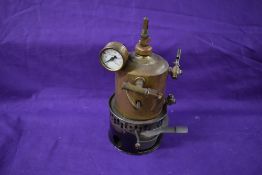 A Bing (DRGM), GB with crossed swords crest, brass boiler having Sutty Pressure Gauge fitted