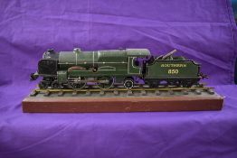 A Hornby Meccano clockwork 0 gauge 4-4-2 Southern Lord Nelson Loco & Tender 850, on wood display