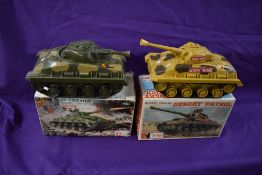 Two Clifford Toys battery operated and plastic Tanks, Sherman M-4 and Desert Patrol, both boxed