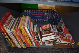 A selection of Manchester United memorabilia including 1983 FA Cup Final Flag, modern badges,