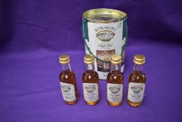 A Bowmore Miniatures Four Bottle Gift Pack containing Legend, 12 year old, 17 year old and 21 year