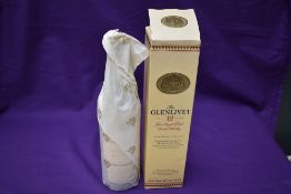 A bottle of The Glenlivet Pure Single Malt Scotch Whisky, Aged 12 Years, 70cl, 40% Vol, in card box