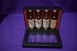 A Signatory Vintage Scotch Whisky Four Miniature Bottle set, Vintage 1974 Caol Ila bottled 93,