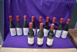Three half bottles of La Bergerie Baron De Phillippe Rothschild 1967 Mouton-Cadet and nine half