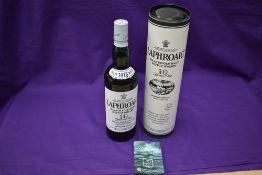 A bottle of The Laphroaig Islay Single Malt Scotch Whisky, 10 Year Old, 70cl, 40% Vol, in card tube