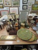 An collection of items including brass lamp with spaniels to base,two mirrors,trays, candlestick