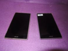 Two Asus Zenpad computer tablets.