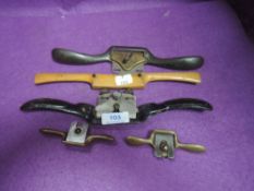 A selection of wood or cabinet makers spokeshave including miniature brass bodied and beech wood
