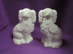 A pair of Staffordshire mantel dogs.