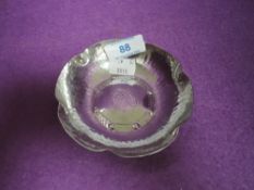 A Lakeland Rural Industries Borrowdale hammered bowl in the design of a Lancashire rose