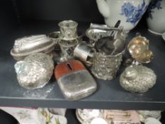 A variety of vintage plated ware including desk top lighter, salt and pepper pots in the form of