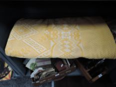 A vintage ochre and white bed throw having floral pattern and motifs,thought to be around 30s/40s.