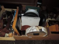 An assortment of clocks, various styles and sizes.