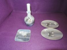 Four items of Royal Copenhagen amongst which are two snow drop patterned plates, a pin dish