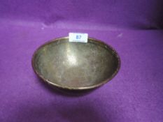 A brass bowl having extensive chase work to inner and outer body with Islamic or Egyptian design