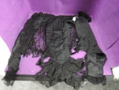 A heavily beaded Victorian bodice,possibly to be worn over another garment.