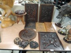 A good selection of hand carved wooden panels in oak and similar woods