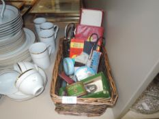 A selection of desk top stationary items including vintage tins