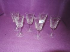 Six Waterford wine glasses or sherry glasses.