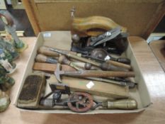 A selection of wood or cabinet makers assorted hand tools including Bailey plane and hand cranked