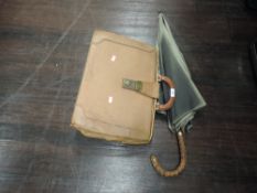 A gentleman leather satchel and similar vintage umbrella