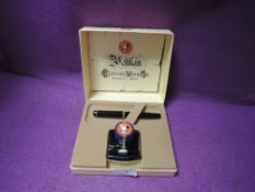 A west German Gunther wagner pelikan fountain pen in black with gilt details in original box with