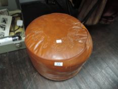 a vintage 60's styled leather foot stool or puffe