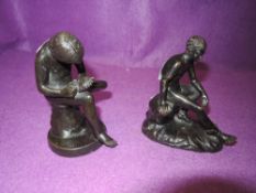 Two bronze figures possibly of Greek mythological interest.