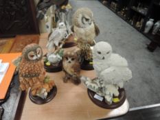 A selection of figures and figurines by Country Artist including Owl and Falcon